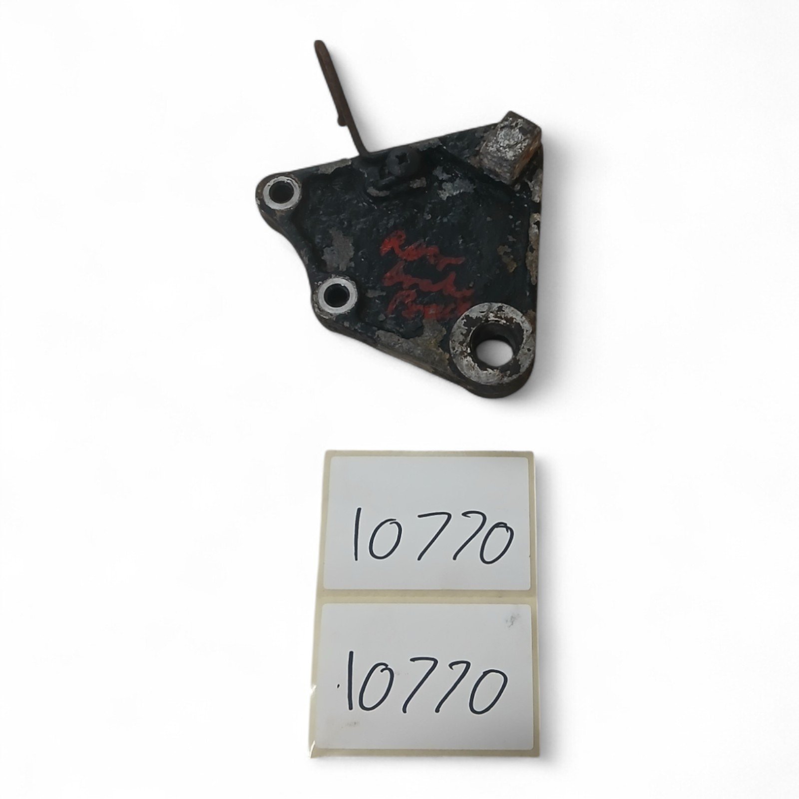 10770_2028129-Photoroom.jpg Hyosung GT125 125 2006 Rear Brake Bracket OEM - Image 1