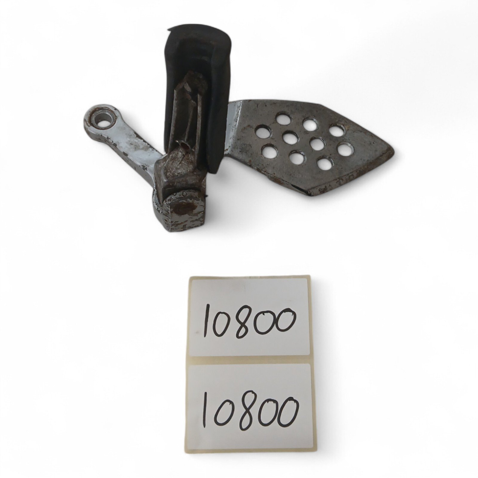 10800_2028129-Photoroom.jpg Hyosung GT125 125 2006 Left Side Footpeg Pillion Hanger Bracket OEM - Image 1