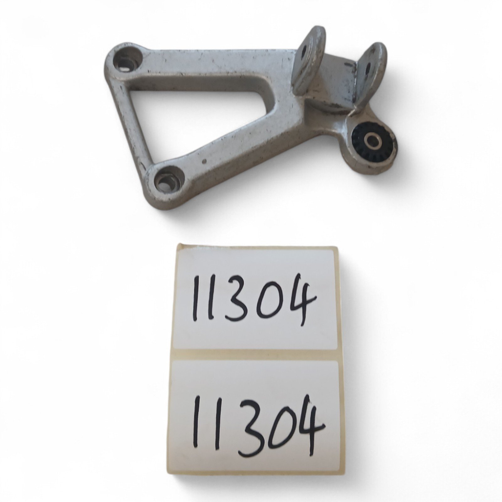 11304_2028129-Photoroom.jpg Cagiver Mito 125 125 1997 Rear Left Footrest Bracket OEM - Image 1