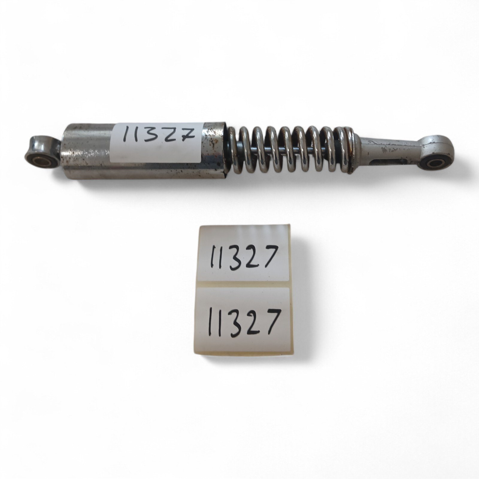 11327_2028129-Photoroom.jpg Baotian BT110-2 110 2008 Rear Shock Absorber OEM - Image 1