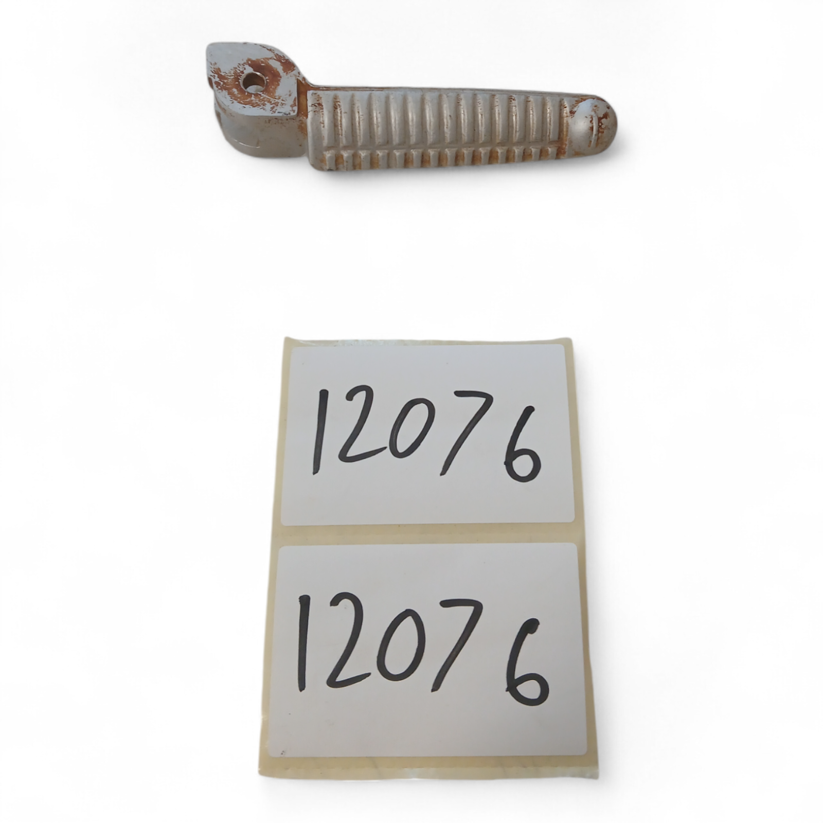 12076_2028129-Photoroom.png Ducati Monster 998 2006-2008 Left Side Passenger Footrest Peg OEM - Image 1