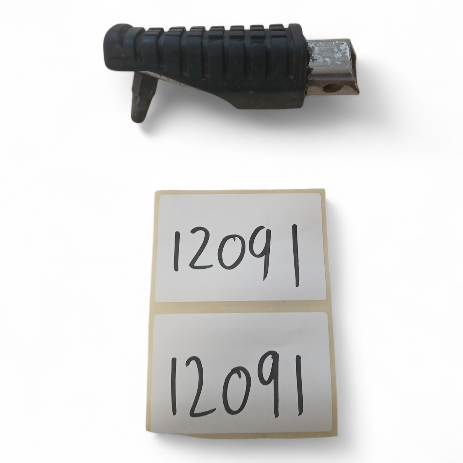 12091_2028129-Photoroom.png Kawasaki ER500 500 2000 Right Side Footrest Peg OEM - Image 1