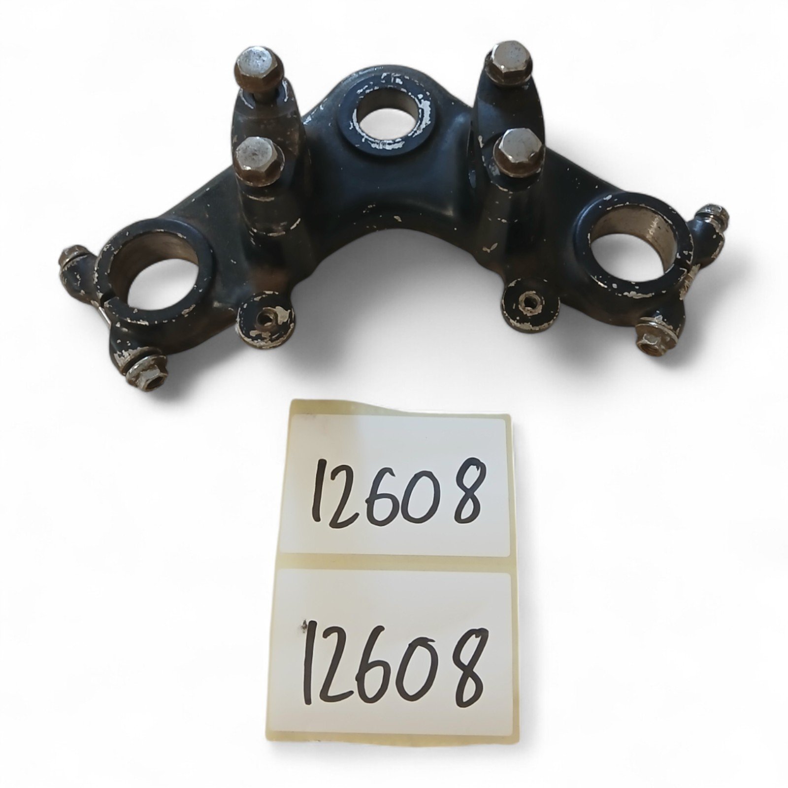 12608_2028129-Photoroom.jpg Honda XR100 / XR100R 100 1986 Triple Fork Top Clamp OEM - Image 1