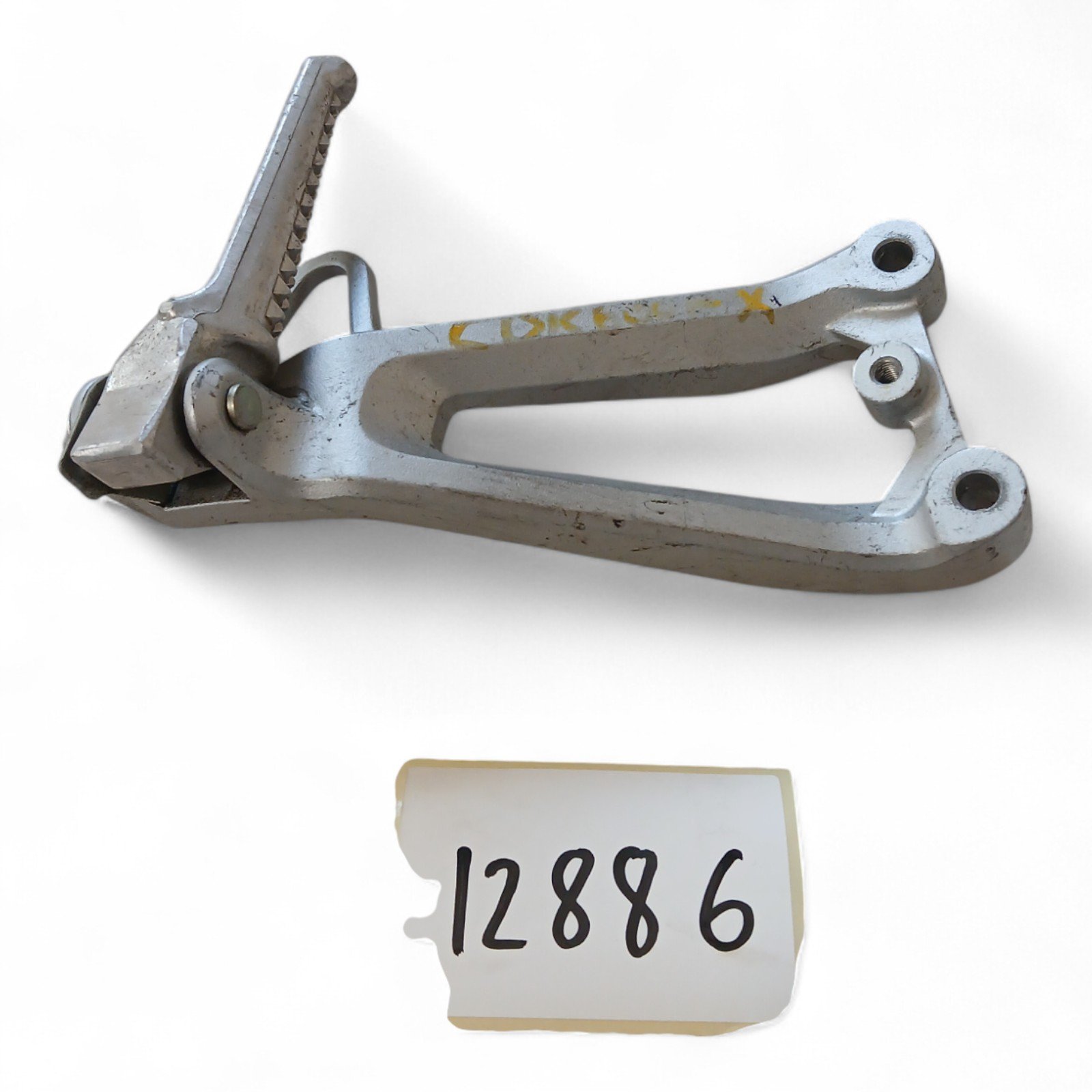 12886_2028129-Photoroom.jpg Honda CBR 600 F4 600 2001-2006 Right Rear Passenger Foot Peg and Bracket OEM - Image 1