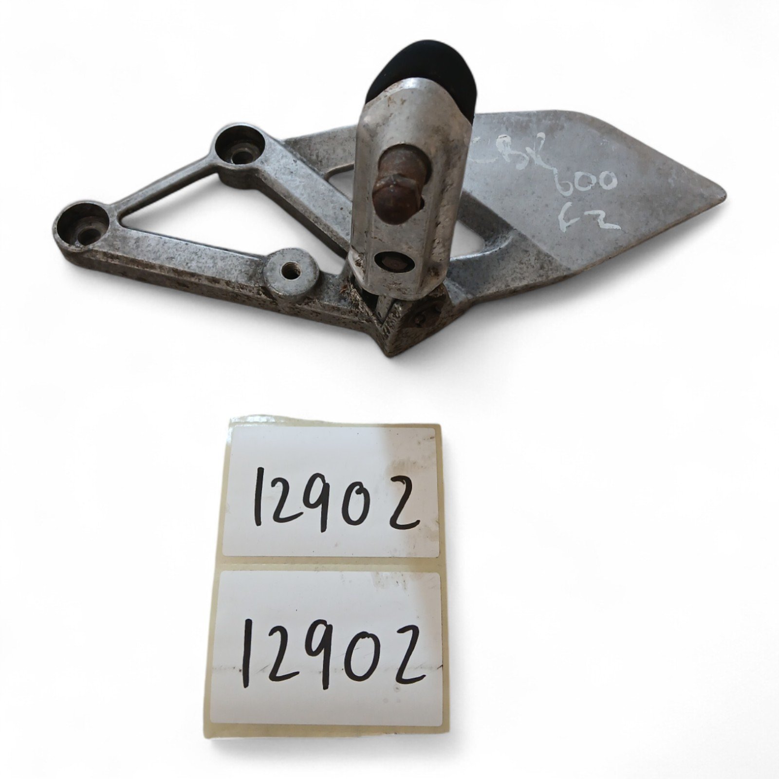 12902_2028129-Photoroom.jpg Honda CBR 600 600 2001-2006 Left Footpeg & Bracket OEM MV9-L - Image 1