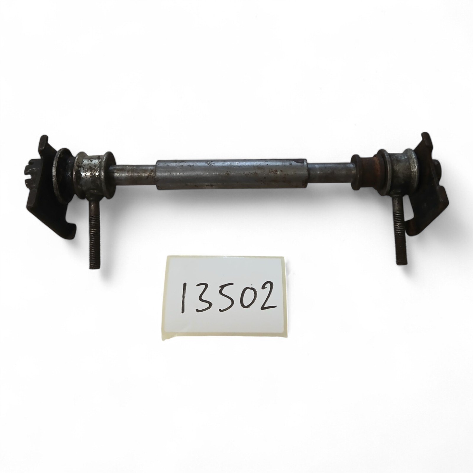 13502_2028129-Photoroom.jpg Yamaha DT 50 50 1989 Rear Wheel Spindle, Bolt, Spacers and Nut OEM - Image 1