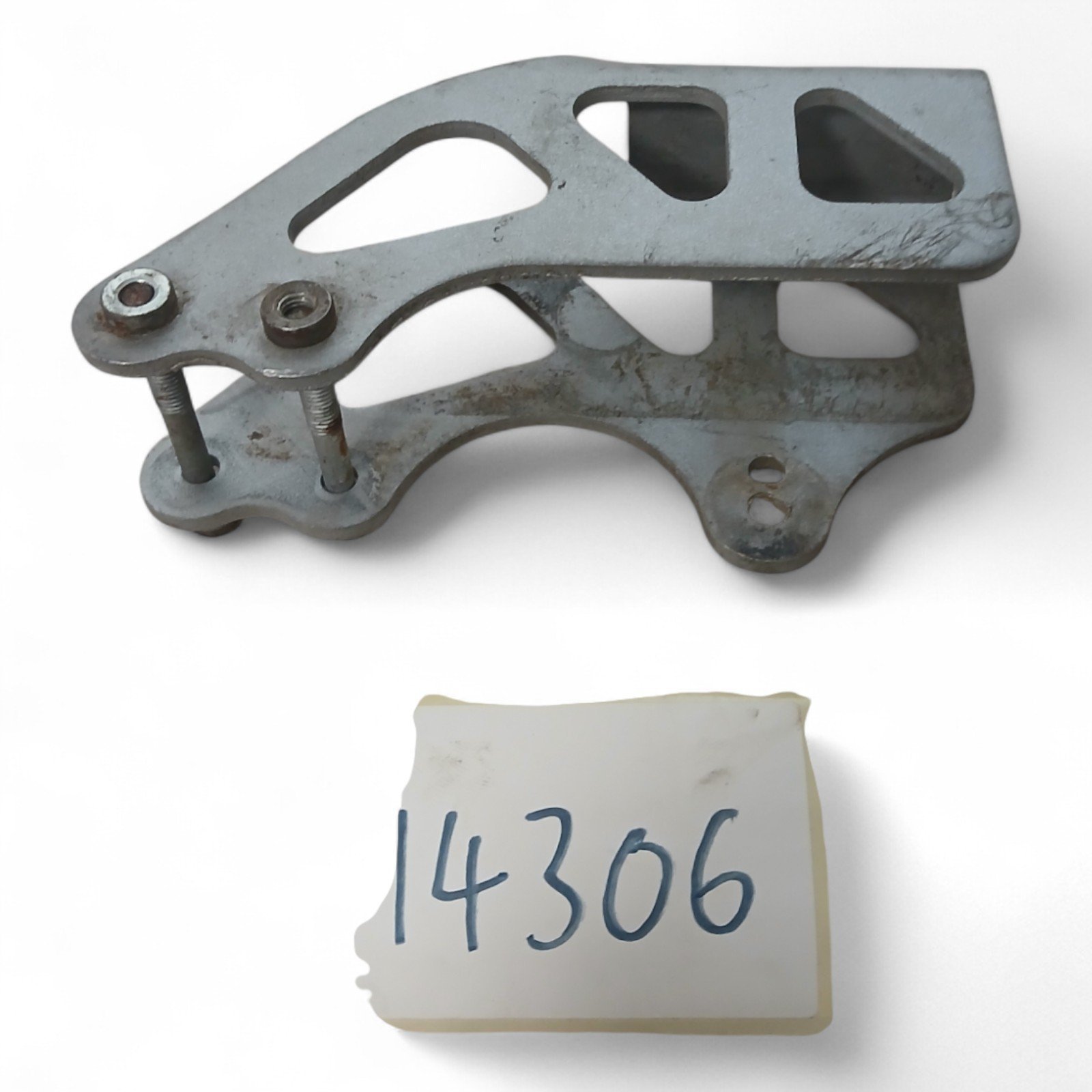 14306_2028129-Photoroom.jpg KTM 400 EXC 400 2006 Chain Slide Cradle OEM - Image 1
